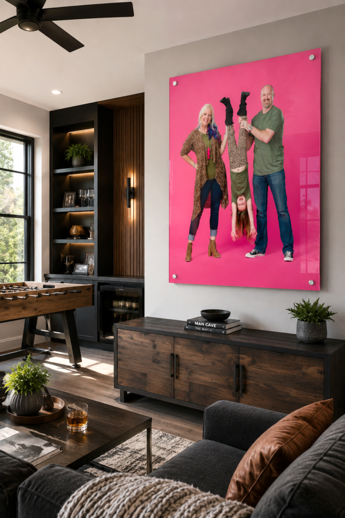 Playful family portrait on a pink background displayed in a game-room visualization